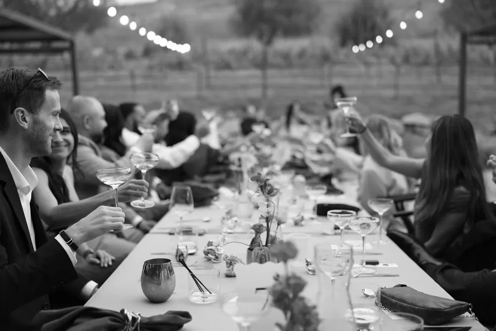 Groom reacting with delight at the wedding reception