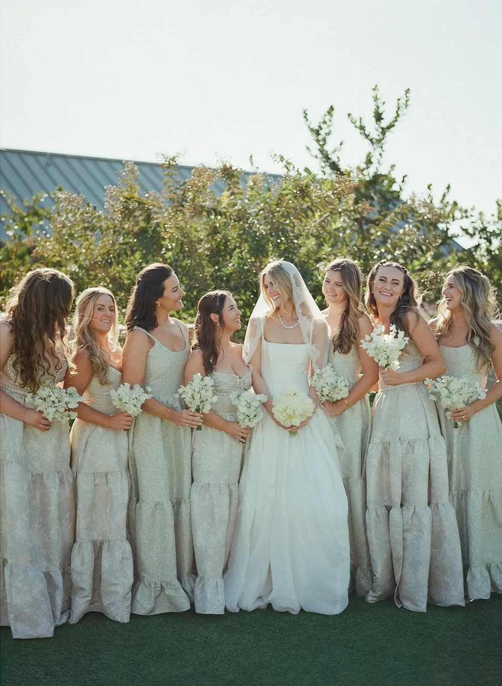 Corinne walking with her bridesmaids at Stanly Ranch